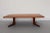 This coffee table was designed and manufactured by Skovby in Denmark in the 1960s. It is made of teak and has two...
