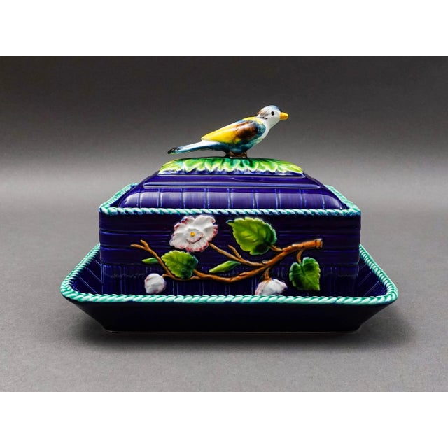 Mottahehedeh Italy Majolica Cobalt Floral Bird Finial Covered Dish With Tray. Measures approximately Top dish: 6" long, 4"...