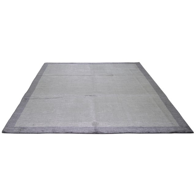 Hand-knotted with care using traditional rug making techniques, this bamboo rug blends timeless craftsmanship with a...
