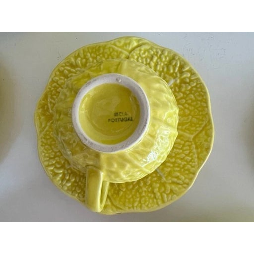 Whimsical and highly collectible mid-century Portuguese majolica from Secla (circa 1950s–1970s), this cheerful yellow...