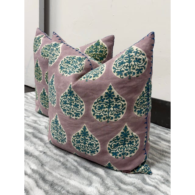 Design Plus Gallery presents a Pair of the Charua Pillows from John Robshaw. Each pillow displays a lavender background...