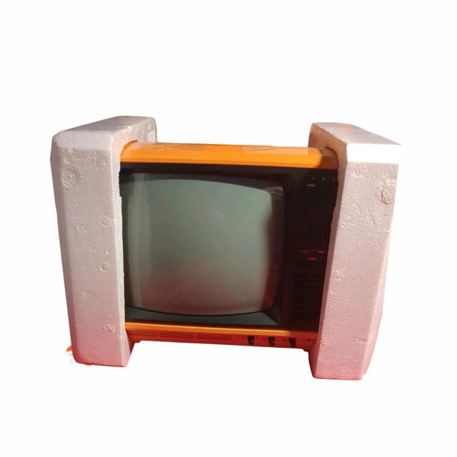 Here's a design classic in orange. 1970s philips tx tv in original packaging space age portable new old stock orange...