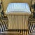 Striped Blue and White Ottoman For Sale - Image 9 of 9