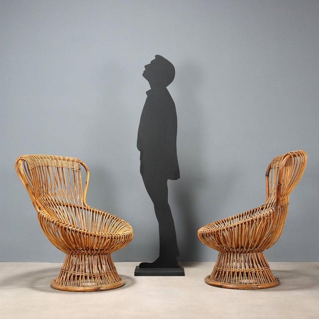 A pair of iconic 'Margherita' armchairs, winners of the gold medal at the 9th Triennale. Designed by Franco Albini, they...