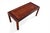 A sleek rectangular coffee table in richly grained rosewood, produced by Vejle Stole Møbelfabrik in Denmark during the...