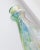 Exciting, iridescent vintage glass vase with pastel-colored, speckled color decor that shines in many different colors...