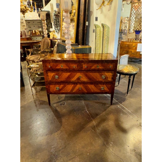 The 18th century Italian Walnut Commode is a stunning piece of antique furniture that exudes elegance and sophistication....