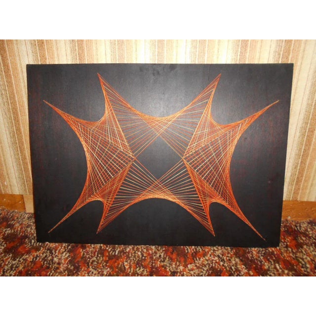 TENDUS SON TABLE. Several shades of orange in gradation on black painted wood.hand-stretched wires, on nails. Very...