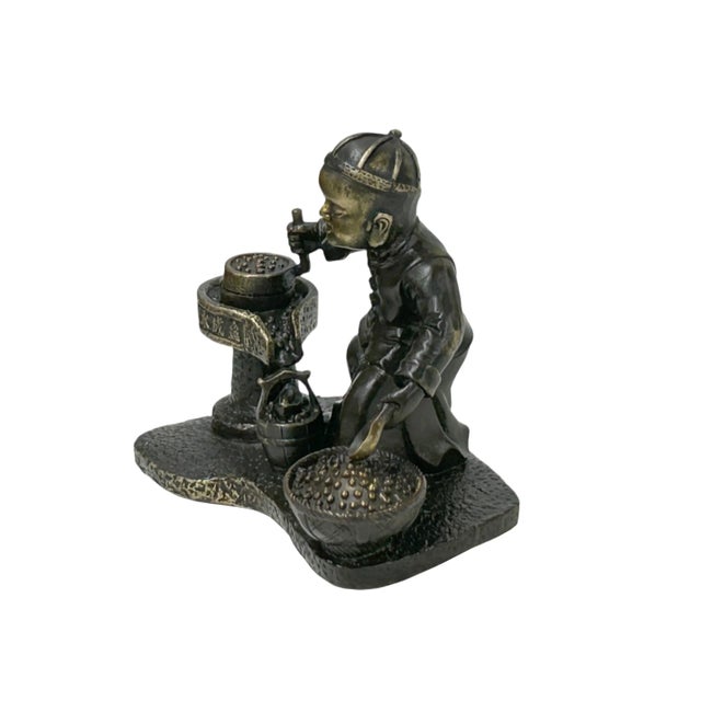 Vintage Bronze Color Metal Old Style Dressing Kid Grinding Pose Statue For Sale - Image 4 of 13