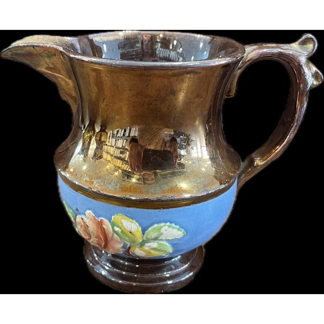 Set if 10 vintage Lustreware pitchers. Various sizes. Lustreware is a type of pottery or porcelain with a metallic glaze...