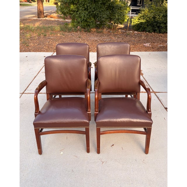 Matching set of four vintage Gunlocke armchairs, model 465, dating to the early 1990s. These substantial Georgian-style...
