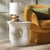 Add a sculptural flair to your home with our stunning Irelyn accent table. With an organic and striking silhouette, our...