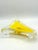 A sculptural mid-century Murano glass catchall bowl featuring vibrant yellow glass encased in clear glass using the...