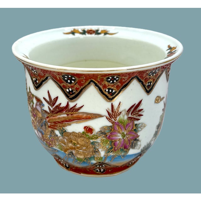 Hand-Painted Asian Porcelain Planter with Birds, Florals & Gold Accents A vibrant and intricately detailed porcelain...