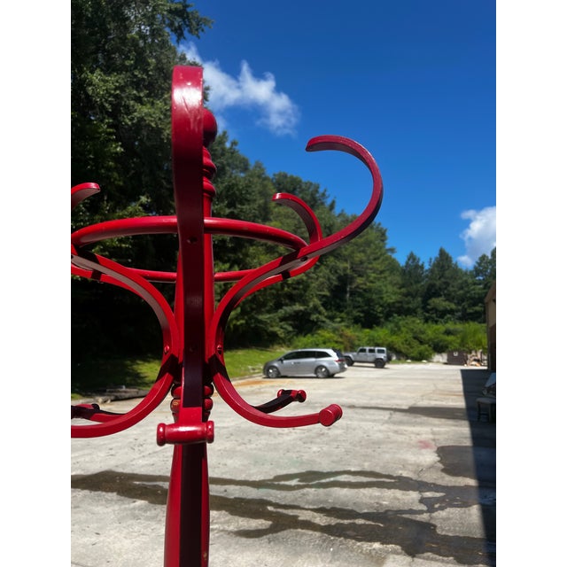 Up for consideration is a beautiful vintage red wooden hat/coat rack with a slight condition issues. This would look...