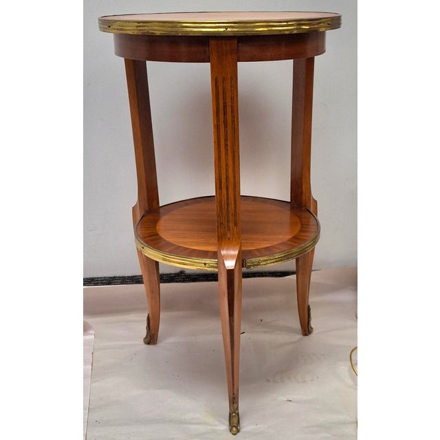 A Louis XIV Style Gilt Metal Mounted Mahogany Parquetry Candle Stand Side Table by Danby Furniture. Measures 13.5" in...