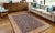 "Enhance the ambiance of your home with this magnificent Persian-influenced Turkish hand-knotted rug made by skilled...