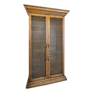 1960s Gold Leaf Finish Wood Cabinet With Carved Lattice Doors and Glass Shelving For Sale