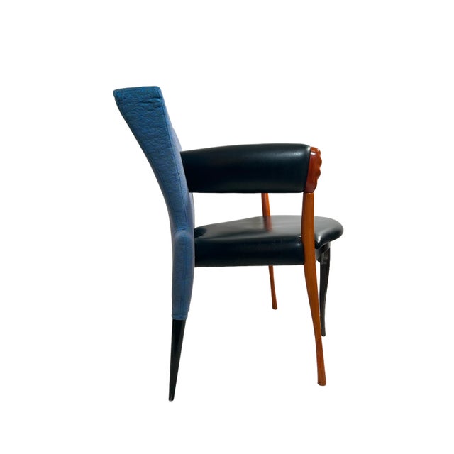 An icon of 80s design. 5 legged Papillon chair by Bořek Šípek. A fabulous melange of matelassé, leather and cherry wood....