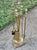 This complete set of Gothic 19th century brass fireplace tools includes a shovel, poke, tongs, and brush. Each tool is...