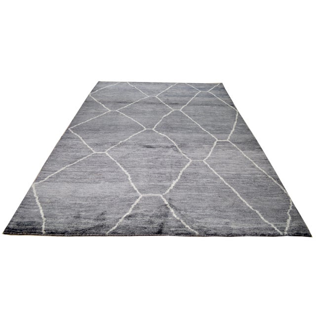 Moroccan Beni Ourain hand knotted rug with natural colors, contemporary style and soft texture.