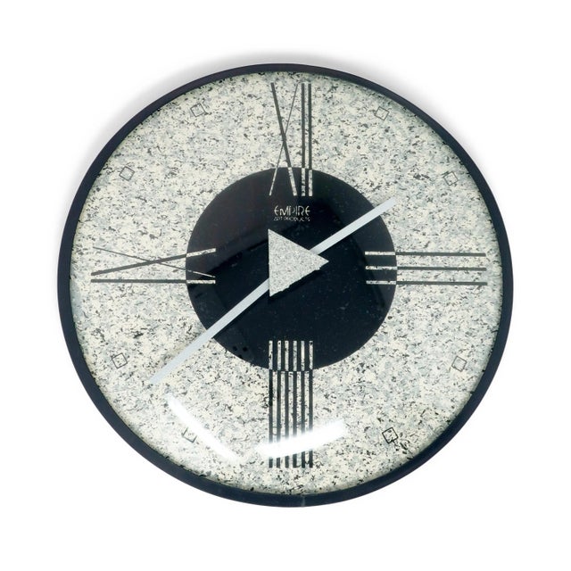 A vintage 1980s postmodern textured wall clock by Empire Art Products in various shades of spelled gray. In excellent...