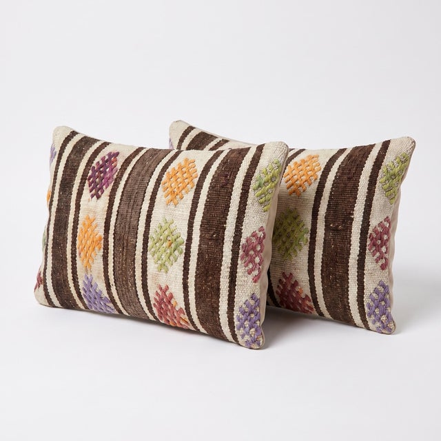 This beautiful 16'' x 24'' pillow cover set was made from authentic Turkish Kilim pieces. Bright colors of wool adorn the...