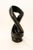 Hand carved black marble abstract art sculpture Perhaps a study in the human form the use of negative space is superb...