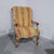 Excellent quality pale rosewood Regency open library armchair, in striped fabric, original castors, in excellent overall...