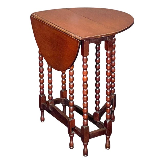 English Sutherland Drop-Leaf Table of Mahogany Upon Turned Bobbin Legs For Sale