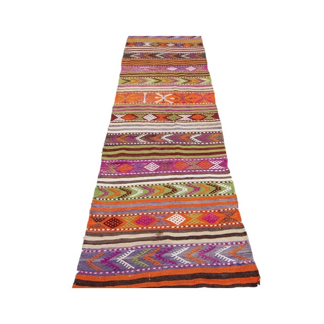 Vintage handwoven decorative kilim runner from Denizli region of Turkey. Approximately 45-55 years old. In very good...