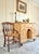 This charming antique sideboard cabinet is full of character and handcrafted detail. Made from solid pine with a warm,...