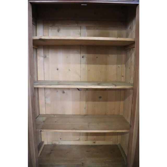 We present this spectacular antique solid walnut wardrobe, made in the mid-19th century in Italy, during the Louis-...