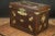 Leather Flat Trunk with Lys Flowerss, in Very Good conditions. Designed 1890 to 1919