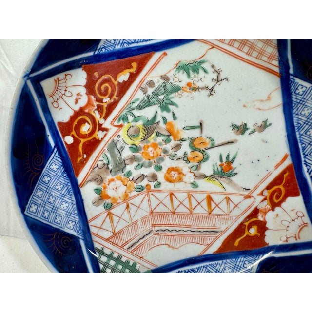 Ceramic Large Shallow Antique Porcelain Imari Bowl Adorned With Birds & Vibrant Floral Motifs From Japan - Circa 1890 For Sale - Image 7 of 12