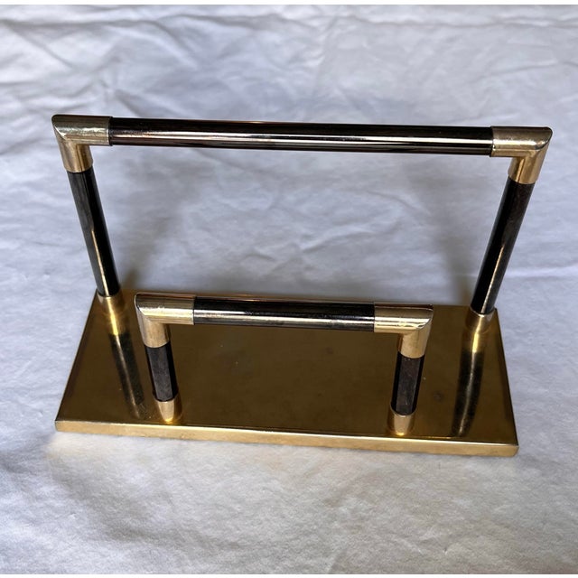 Vintage solid brass envelope holder with mixed metals including warm brass and gunmetal colors. Felted bottom. A unique...