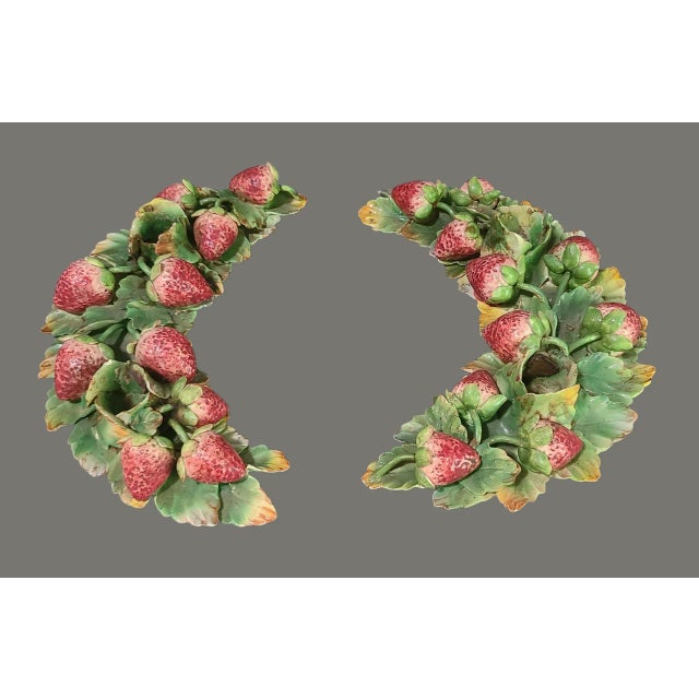 This product is a vintage pair of Italian majolica fruit candle holders in a George Jones style, featuring a strawberry...