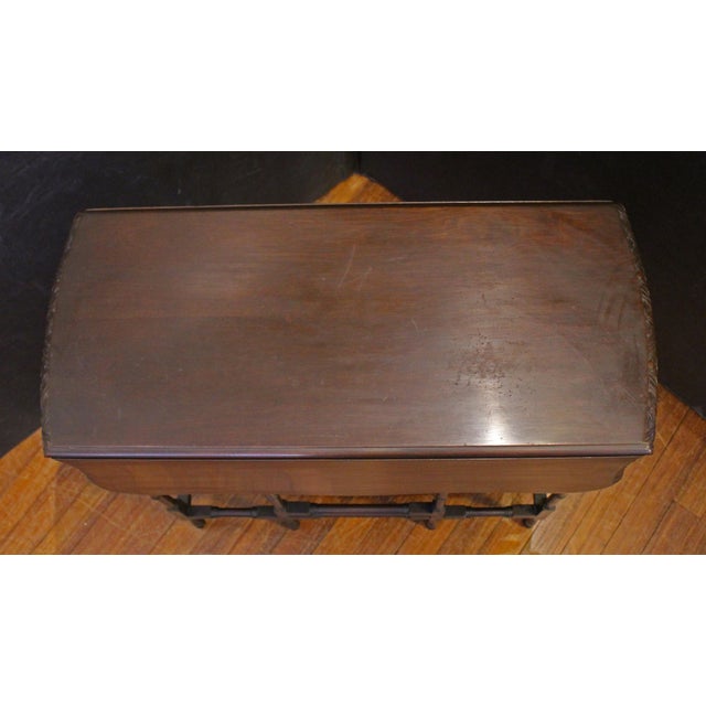 Edwardian period English drop end side table, early 20th century. Elegant Chippendale style. Mahogany. Faux bamboo turned...