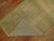 Pale yellow gold vintage Turkish Oushak from the mid-20th century. Measures: 2'7” x 9'11”.