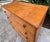 Womderful antique cherry wood 4 drawer chest with dovetailed drawers and hand turned black walnut knobs and feet. This...