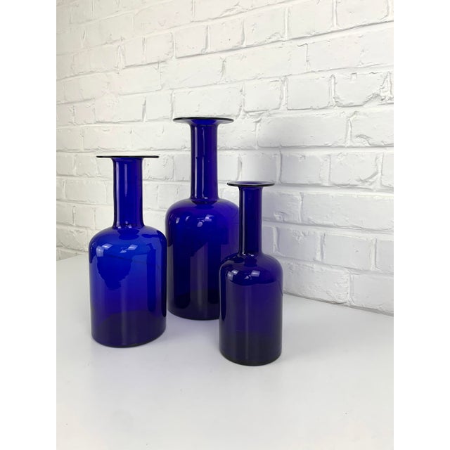 Designed by otto brauer for holmegaard, this beautiful set of three gulvvase floor vases is executed in richly coloured...