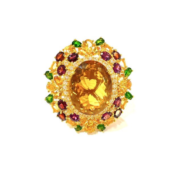 Bochic “Orient” Vintage Lemon Citrine & Multi-Gem Cocktail Ring in 18K Gold & Silver Circa “1990s” At its center, a...