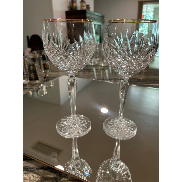 Set of 12 fine cut crystal, "Wine Balloon" glasses. The pattern is "Richmond" by Miller Rogaska and the lip of glasses...