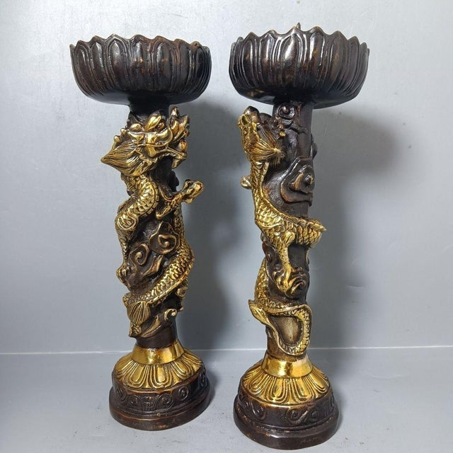 Elevate your space with this striking pair of vintage-style Chinese candle holders. Rich in symbolic meaning and intricate...