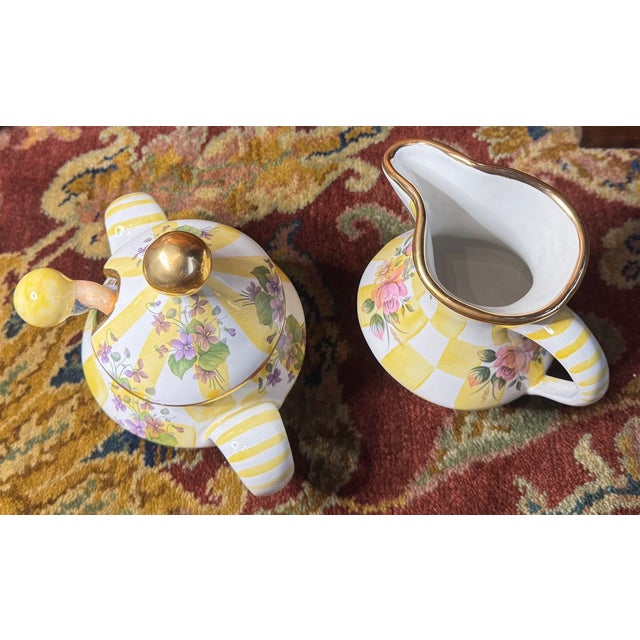 A cheerful and highly collectible MacKenzie-Childs Aurora set in sunny yellow check—complete with original spoon and...