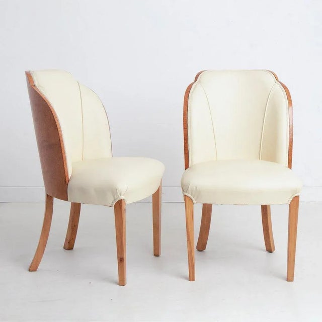 H: 89cm W: 50cm D: 60cm Seat Height: 44cm Art deco dining chairs designed by Harry & Lou Epstein made in burr maple with...