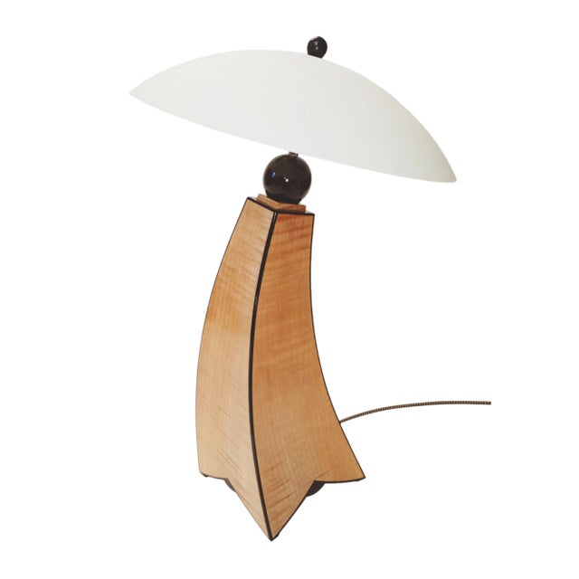 Jazz Inspired fiddle back maple lamp uses fiddle back maple, wenge for. The sphere and inlay, silk cord and LED lighting...