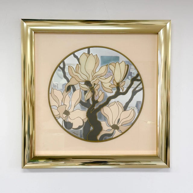 Vintage Academy Arts Magnolia Flower & Brass Frame Art Mirror. The mirror has a brass frame with magnolia flowers silk-...