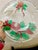 Lovely large glass serving platter with a mistletoe and poinsettia pattern. Ready for your holiday gatherings! Excellent...