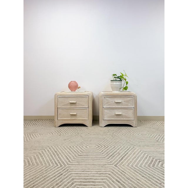 This lovely pair of vintage pencil reed rattan nightstands are a warm and stylish bedroom find that works beautifully...